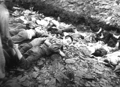 File:Prisoners on ground before execution,Taejon, South Korea.jpg