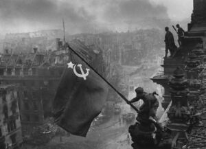 Raising a flag over the Reichstag.jpg